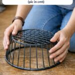 Lady Sticks 6 Cheap Green Plastic Ferns into the Tops of 3 Bright Orange Foam Pool Noodles — Everyone Is Copying This Brilliant Porch Idea for March!